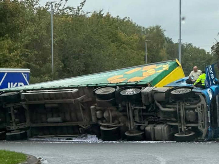 Major Warrington road closed after lorry overturns