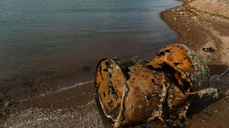 US police identify remains of man found in barrel in shrinking reservoir