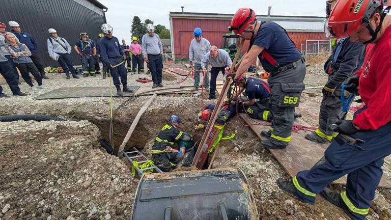 Firefighters rescue man trapped in 10 foot deep trench in Mishawaka
