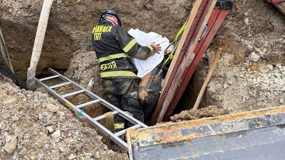 Firefighters rescue man trapped in 10 foot deep trench in Mishawaka