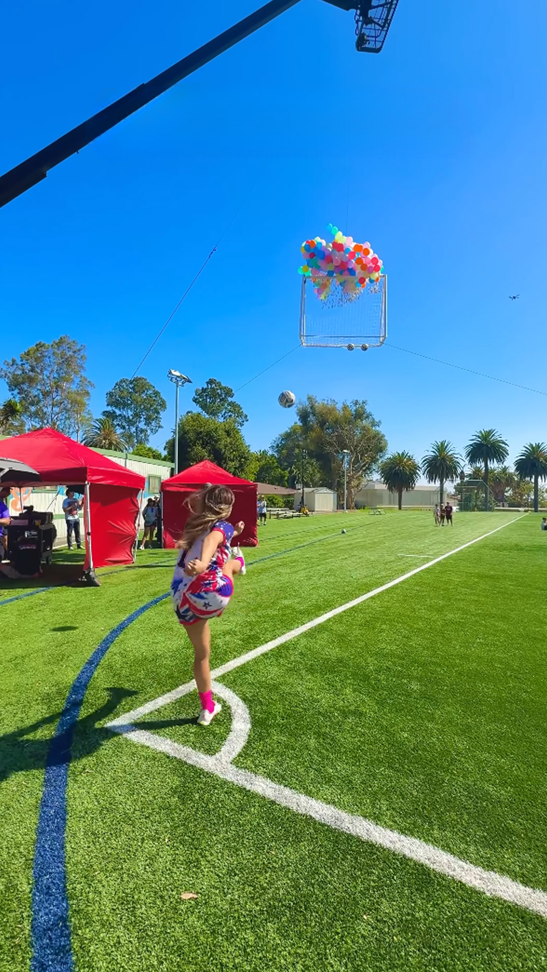Progressive football trick shot challenge into high targets