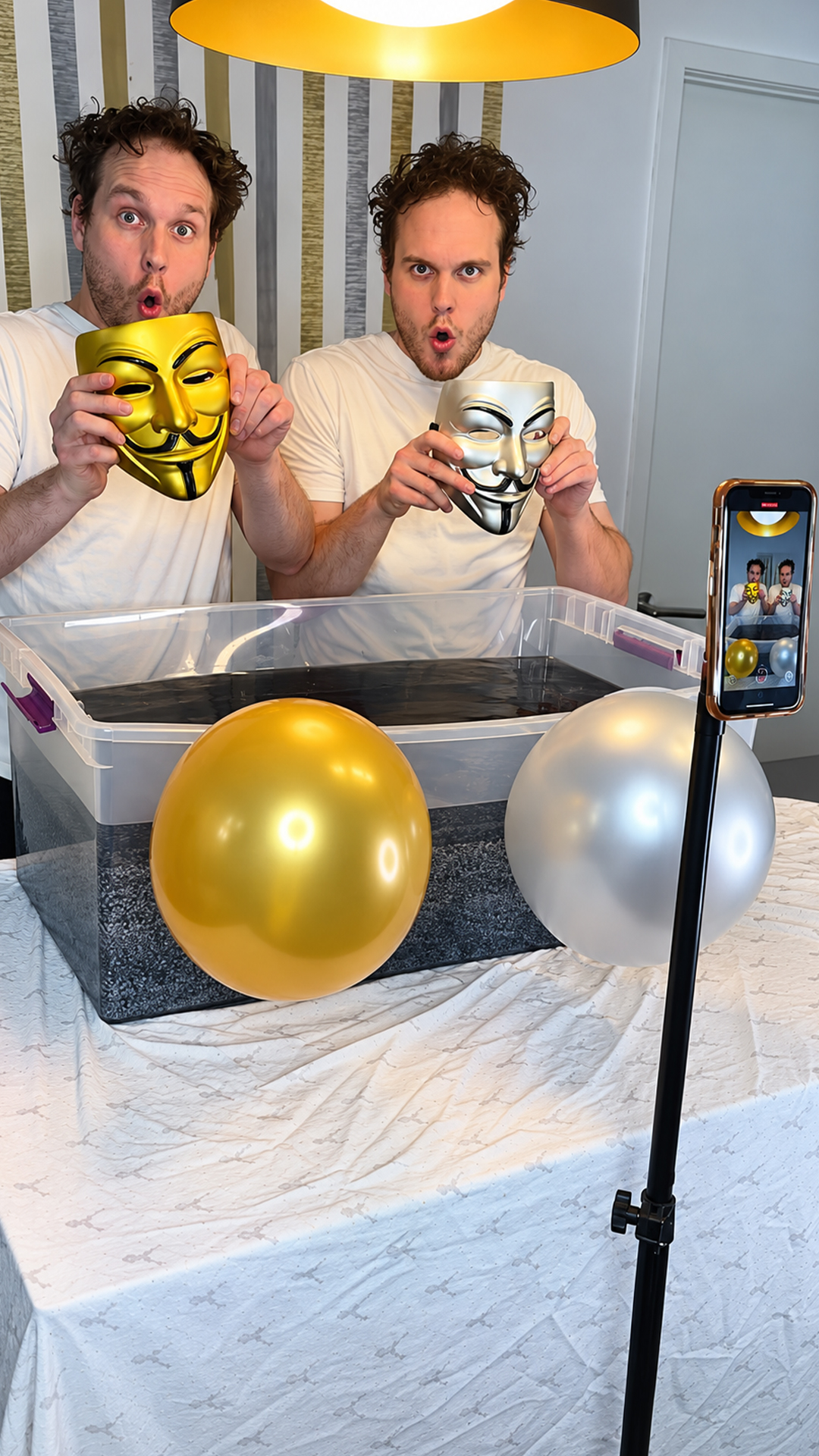 Twins tricking twins with underwater mask