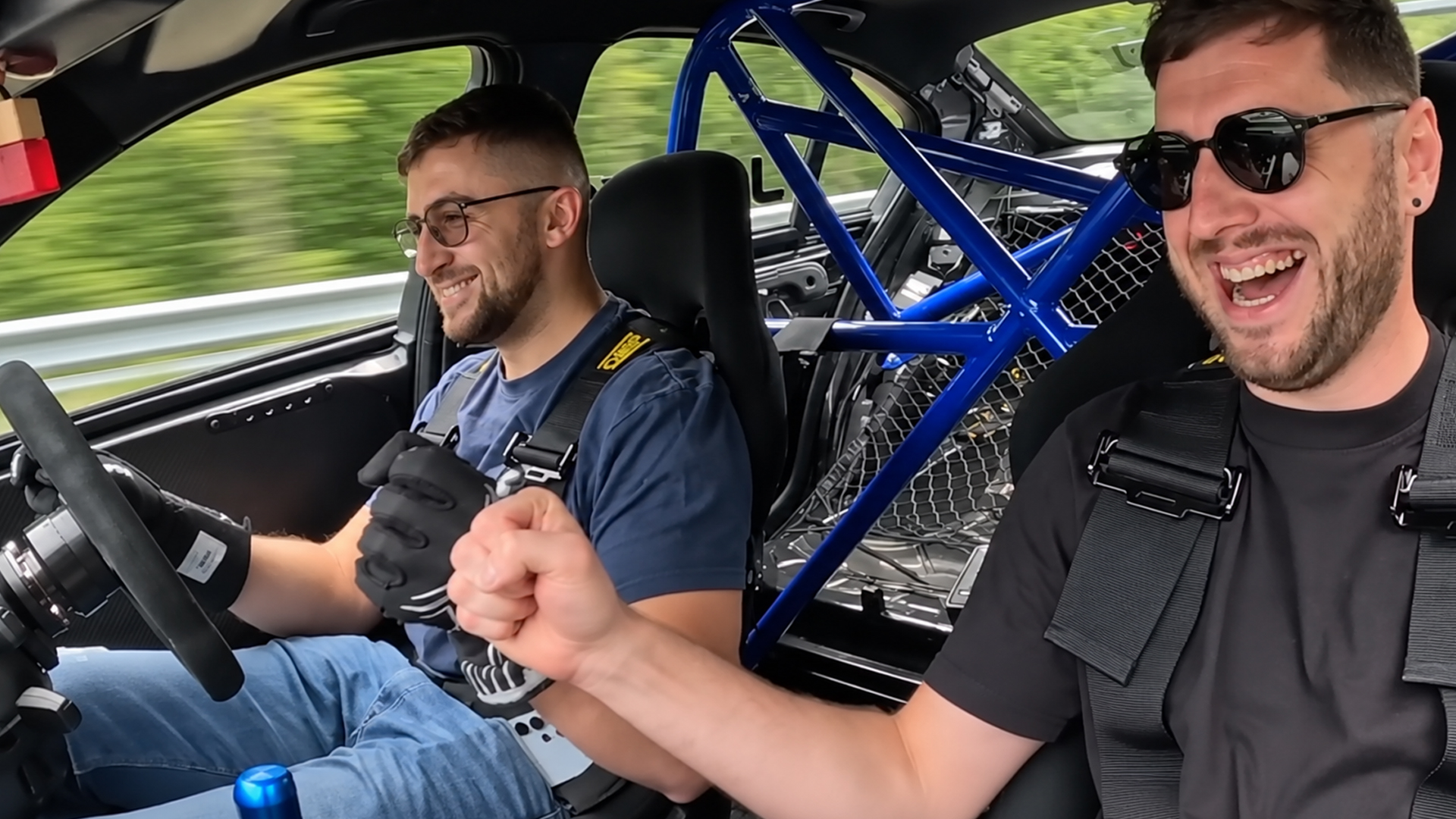 Track car passenger enjoys a full-cage Nürburgring run