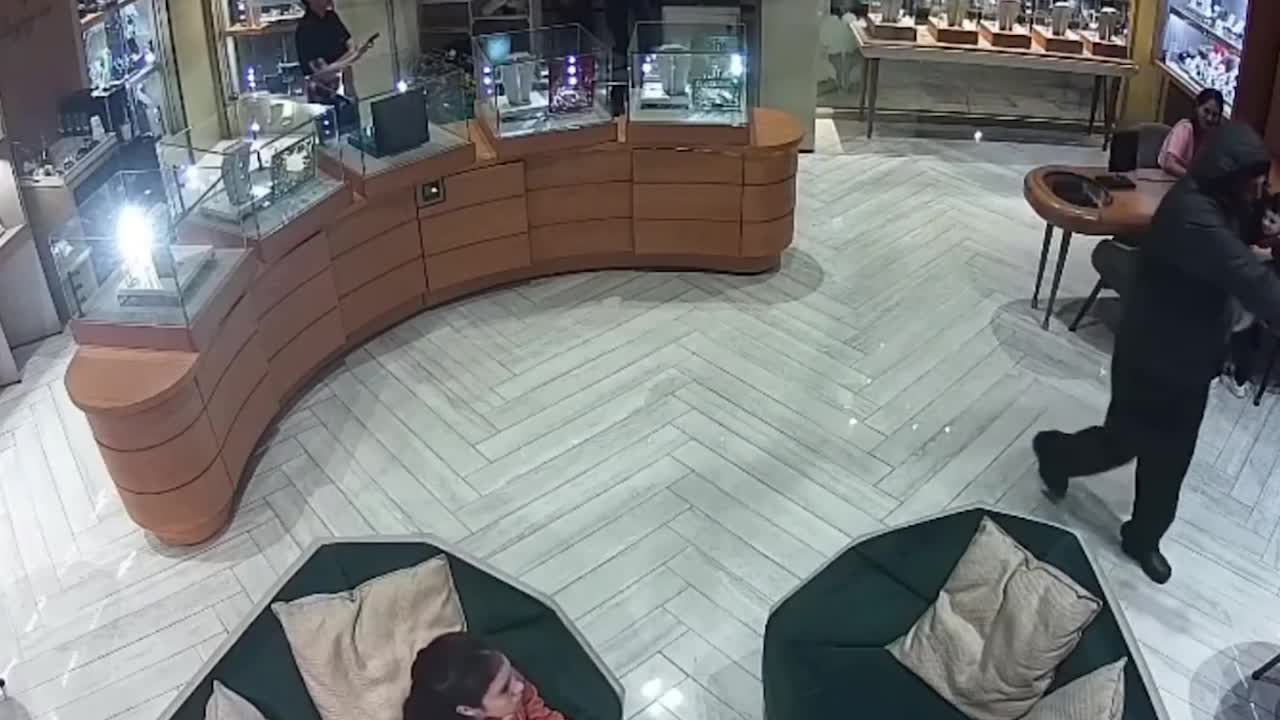 Jewellery store worker accused of helping armed robbers empty display ...