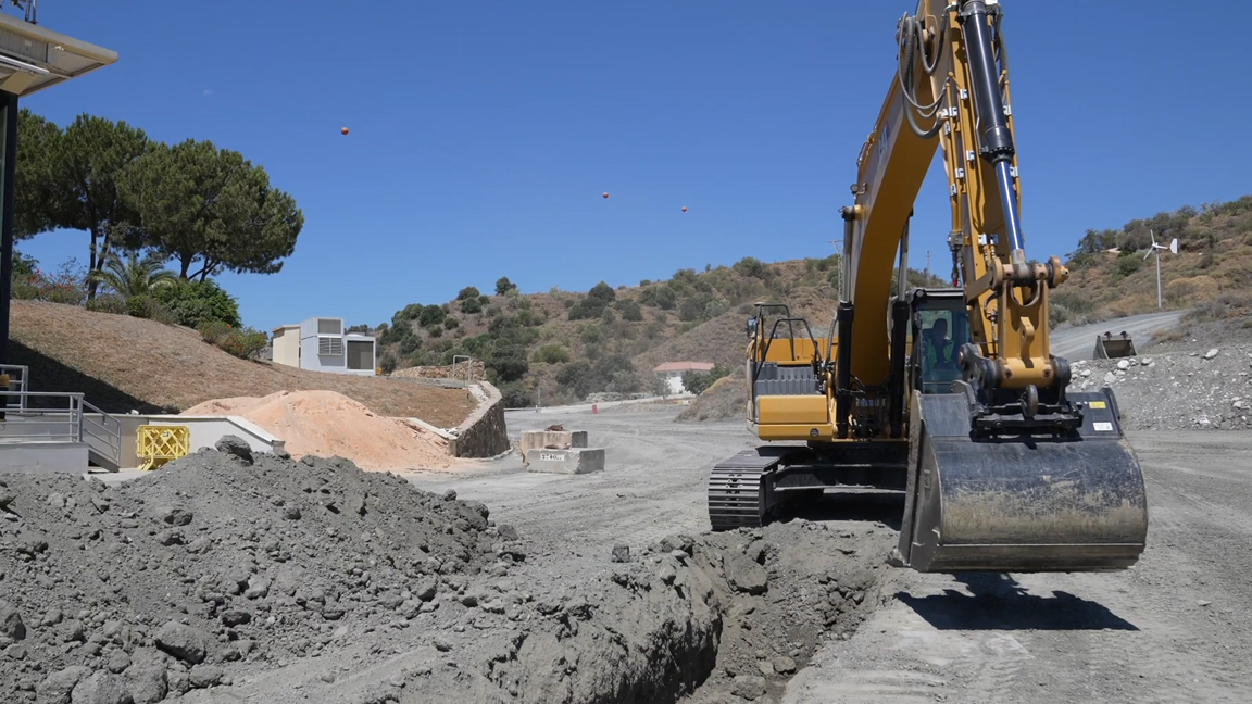 Massive excavator in action! Giant machine digging through hard rocky ...
