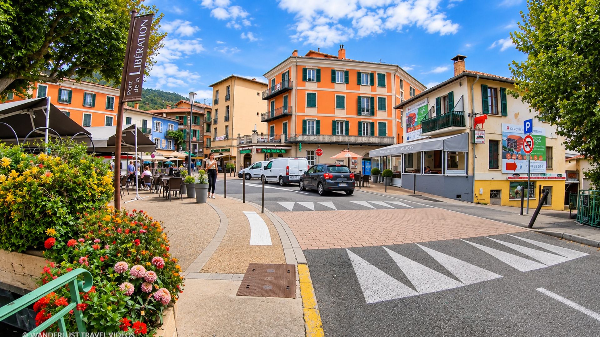 A French village square with mountain views and street cafés (4K)