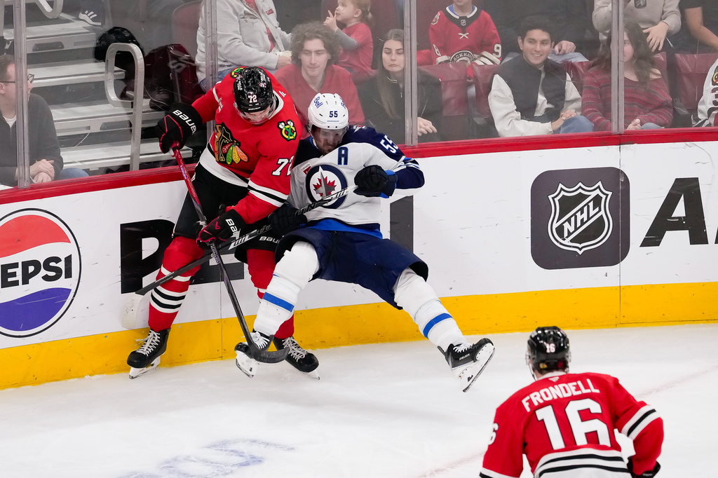 Levshunov scores in OT as the Blackhawks beat the Jets 4-3; Kane sets ...