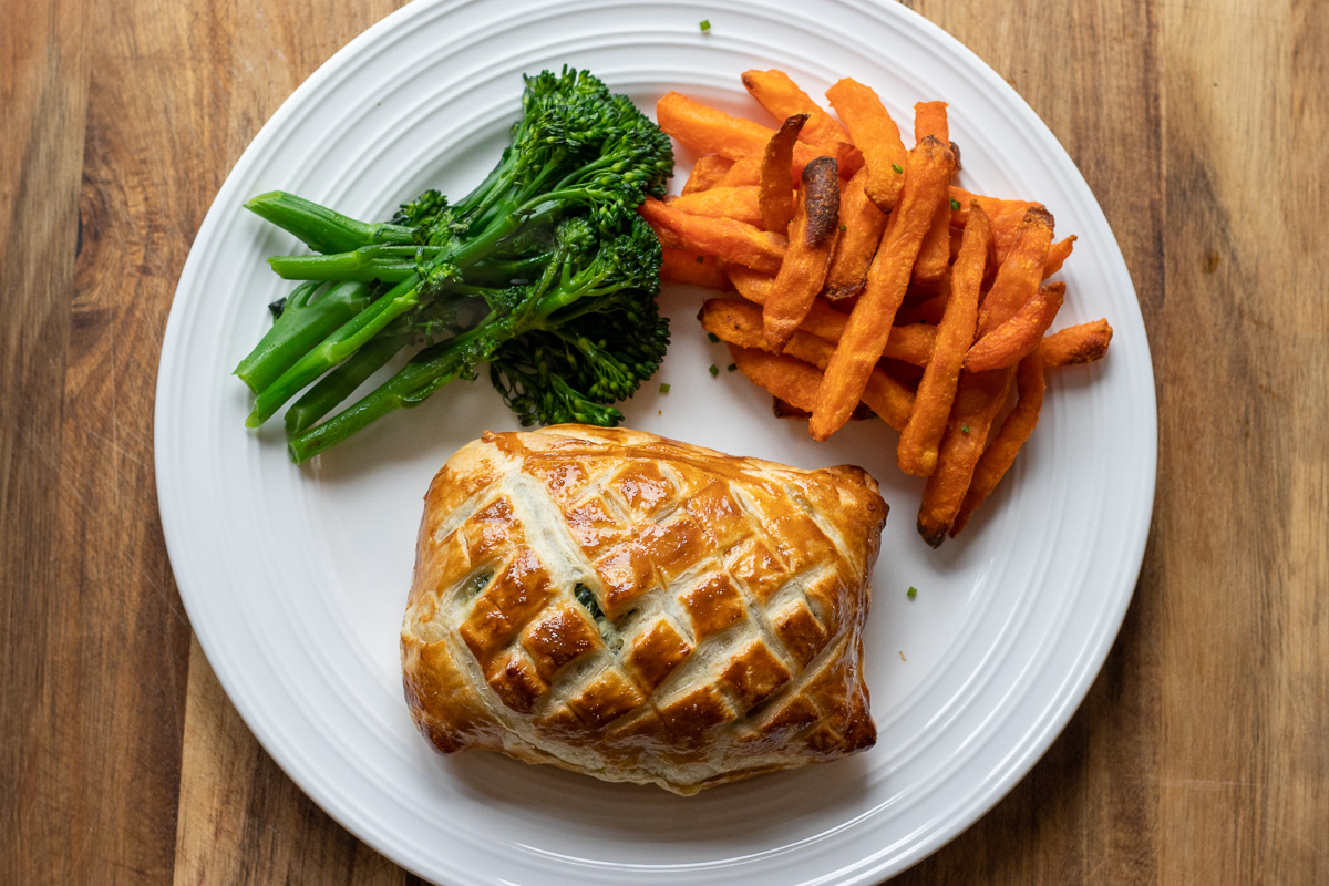 Individual salmon Wellington with spinach and cream cheese