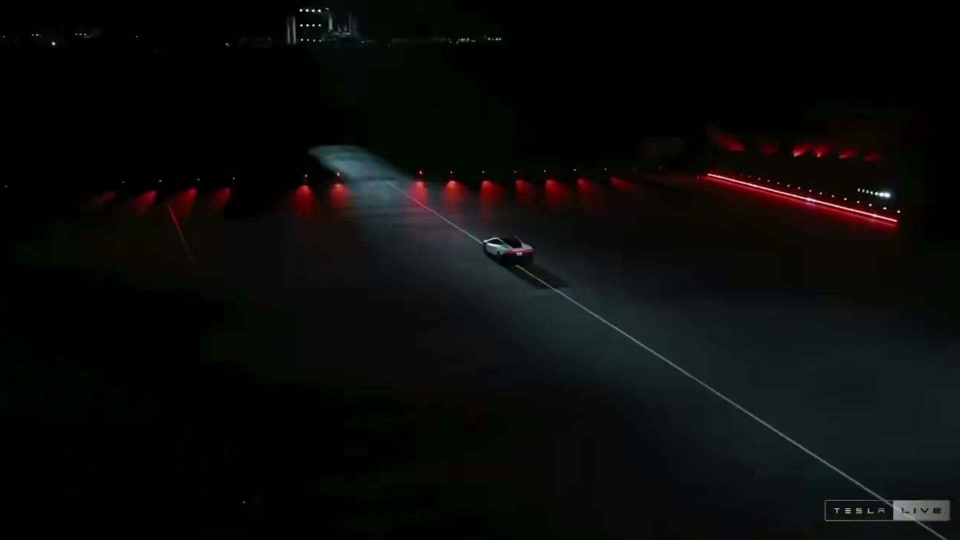 Watch: Tesla unveils 'flying' sports car with rocket boosters