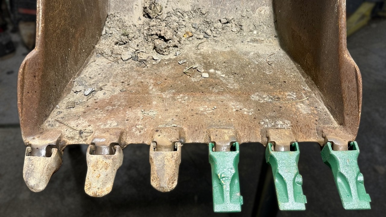 Replacing worn excavator bucket teeth