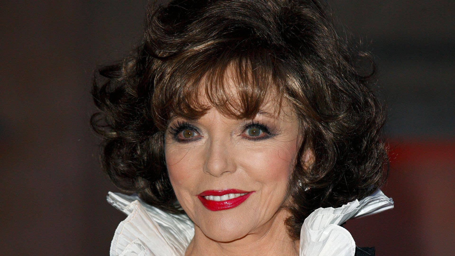 Joan Collins, 93, highlights her ageless beauty in red hot look for 61 ...