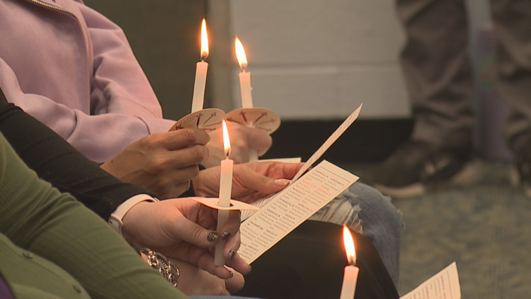 Families come together for annual Domestic Violence Awareness Month candlelight vigil