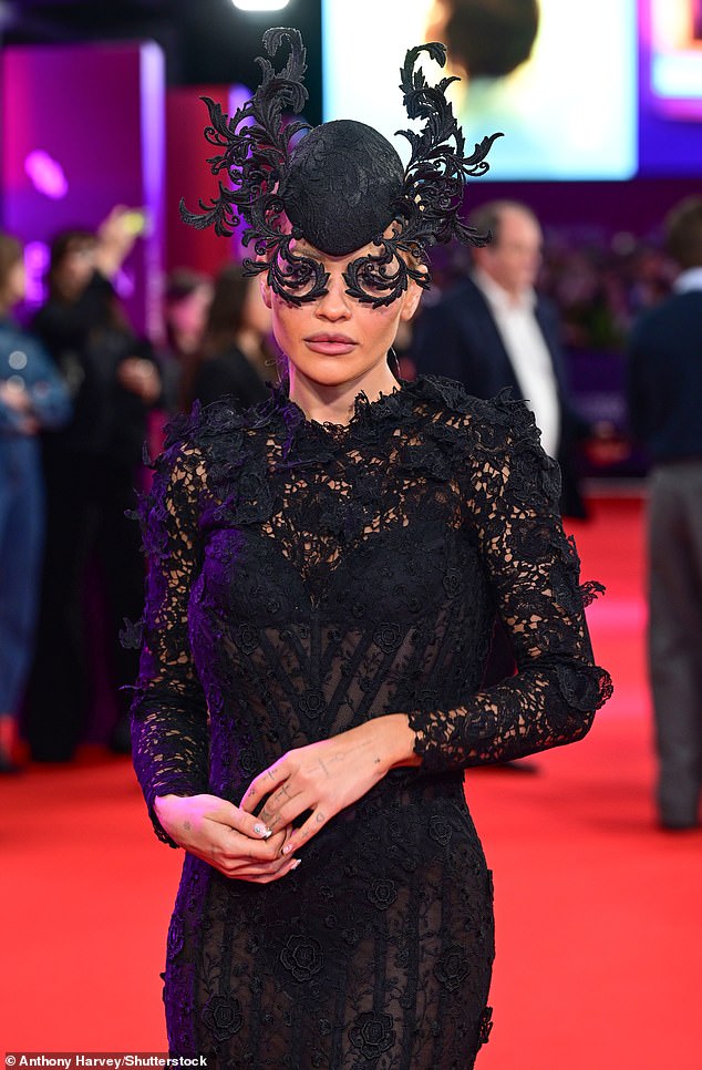 Rita Ora steals the show in a kooky black lace gown