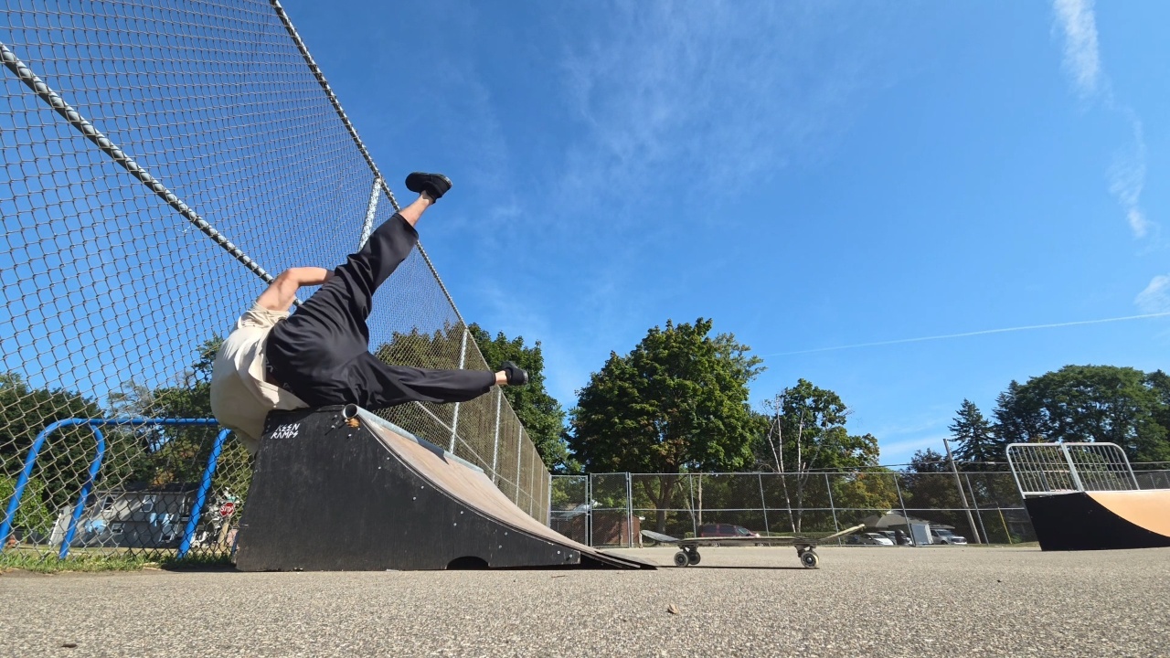 Boy loses control and slams hard onto skate ramp