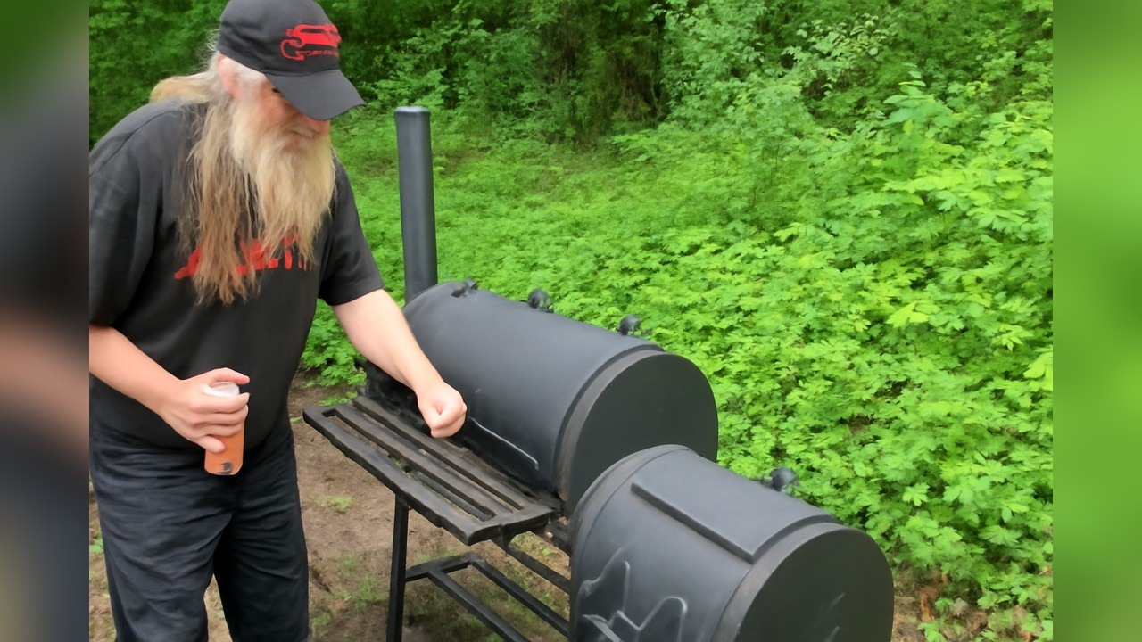 A cook stuffs a fish at the pit (part 1)