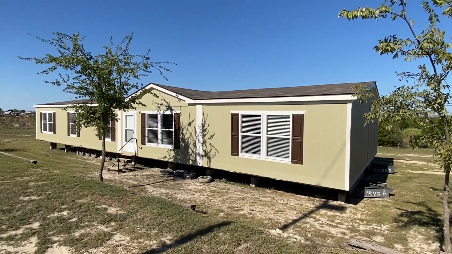 A room-filled layout makes this new double-wide feel enormous