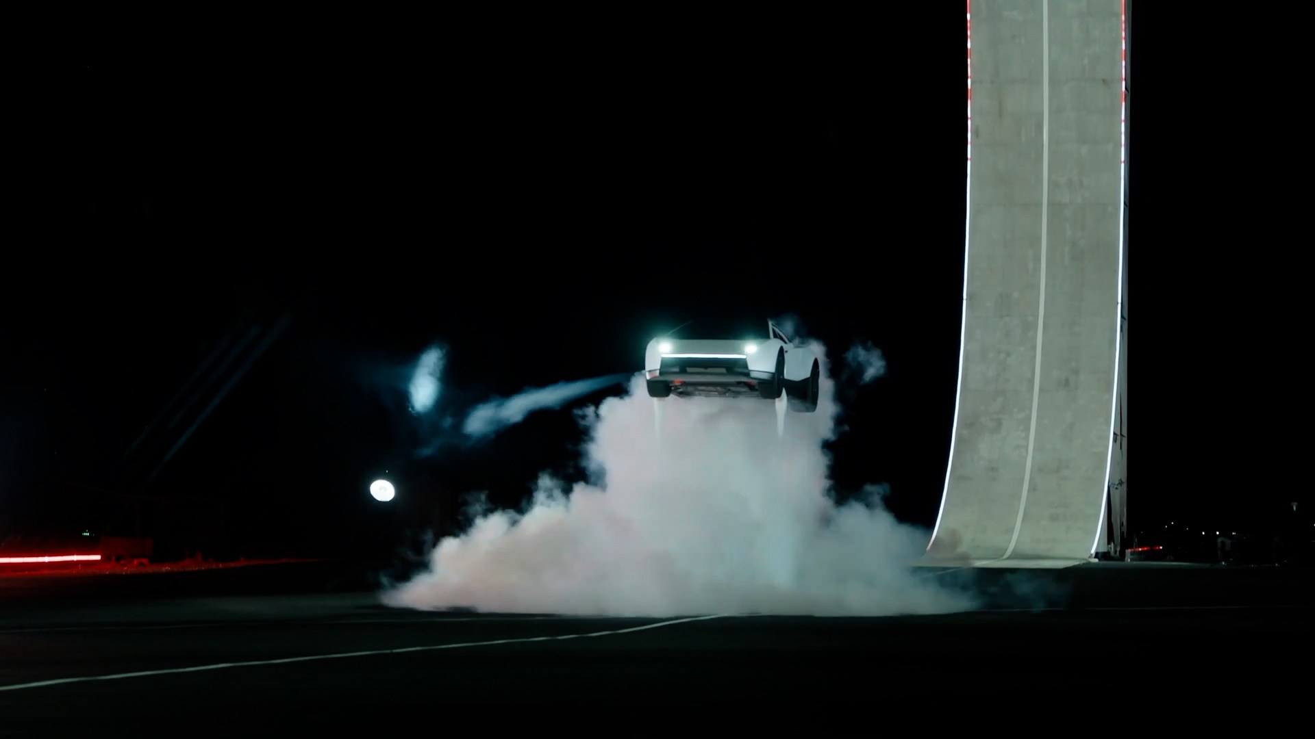 Elon Musk unveils 'flying' Tesla Roadster at SpaceX facility in Texas