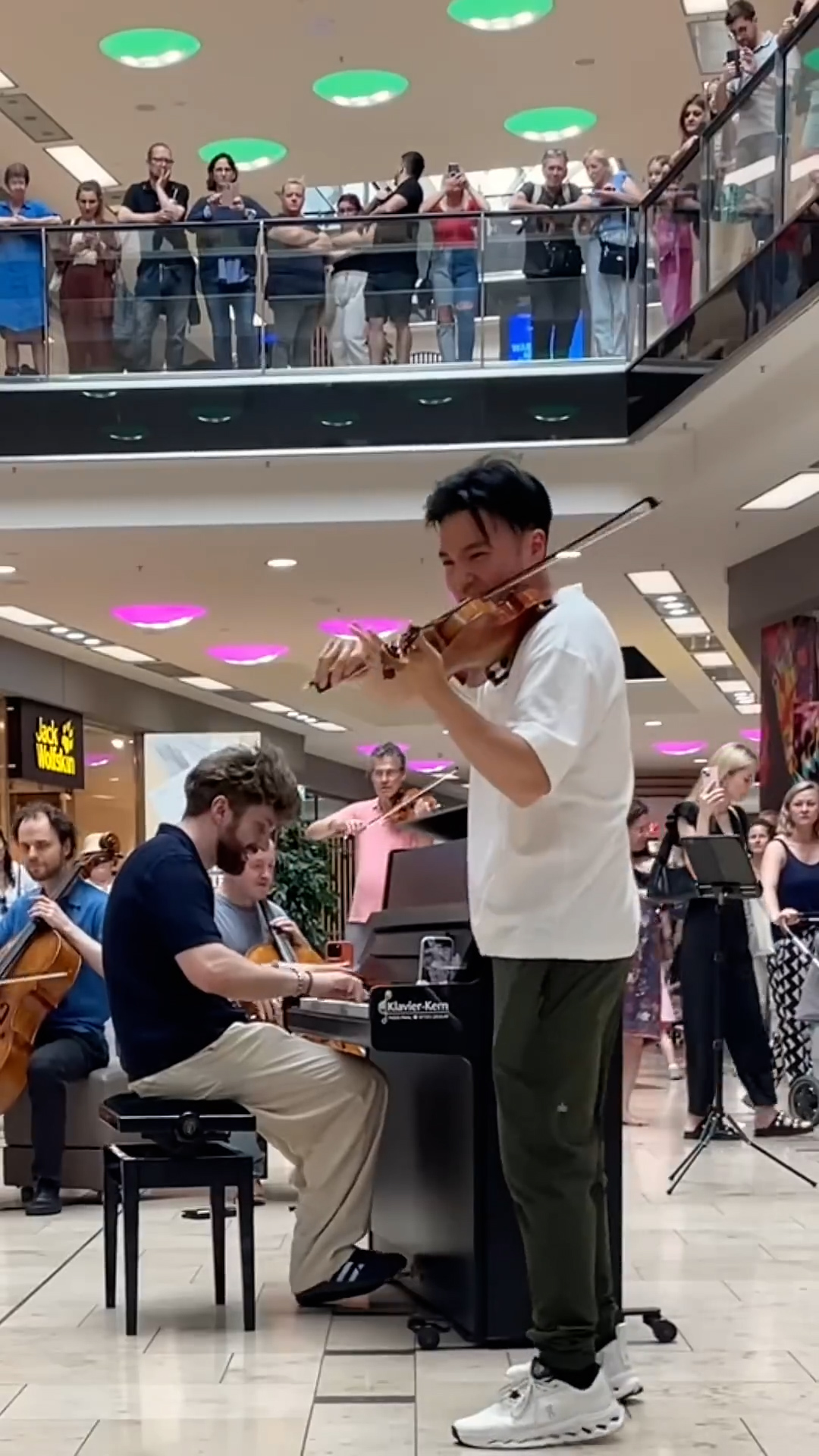 An entire orchestra suddenly appears during a music performance