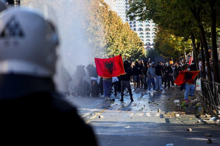Demonstrators display Albanian flags during an anti-government protest by students in Tirana, Albania, October 16, 2026. REUTERS/Florion Goga