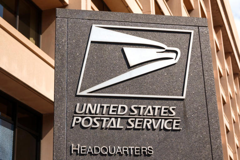 The United States Postal Service logo is displayed outside the agency’s headquarters.
