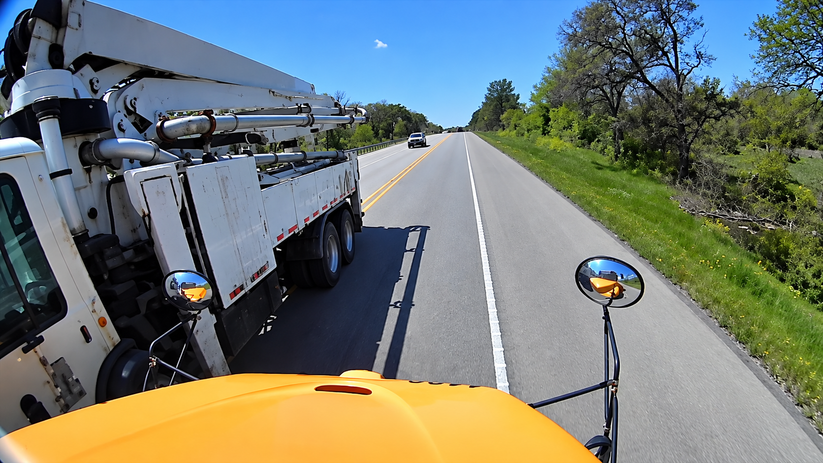 Cement pump truck strikes school bus after crossing into oncoming lane