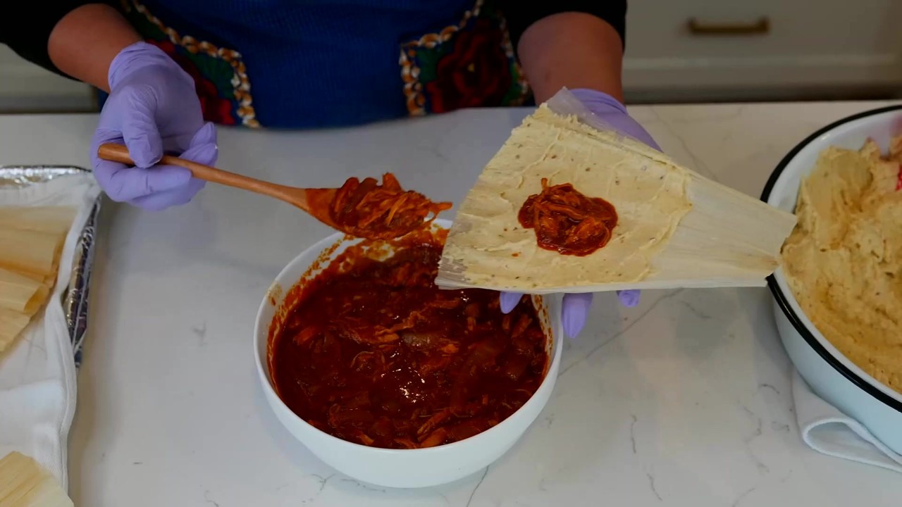 Tamales rojos use soft masa and spicy tinga filling