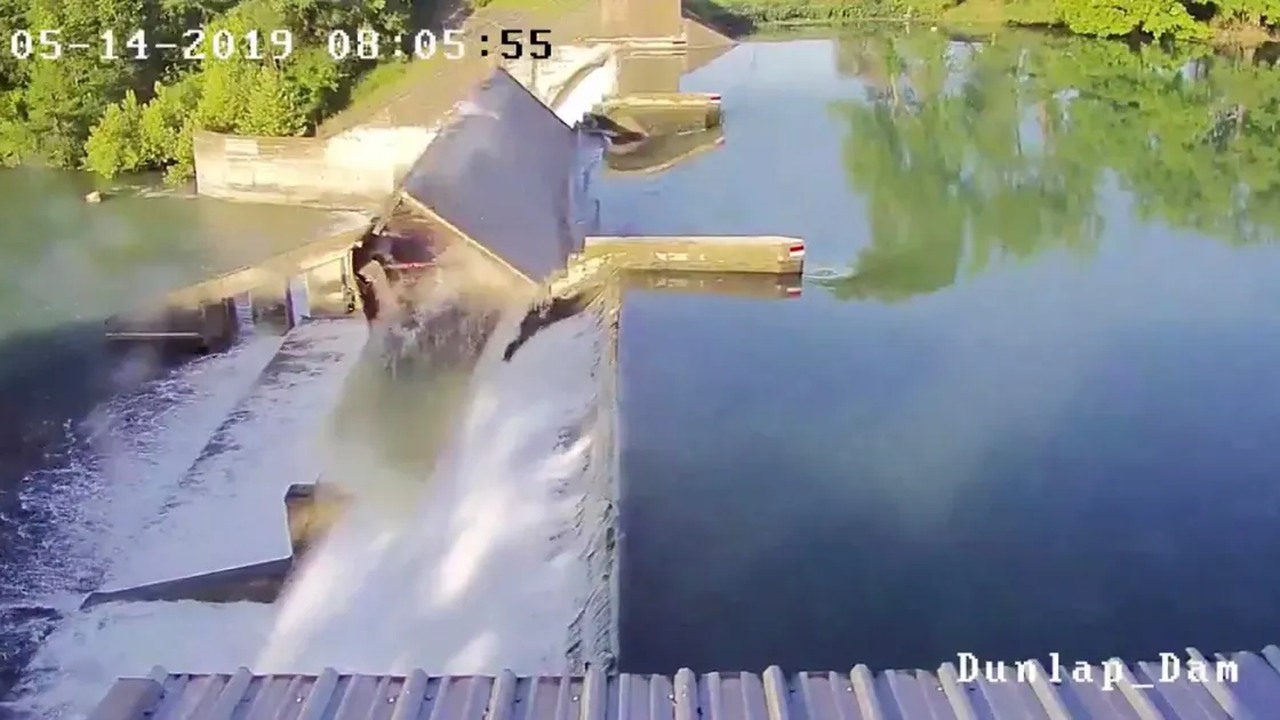 Security cameras captured a dam gate breaking apart on May 14, 2019 ...