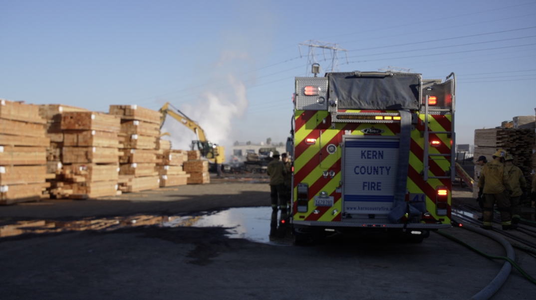 Lumber yard fire damages nearby storage units in Kern County