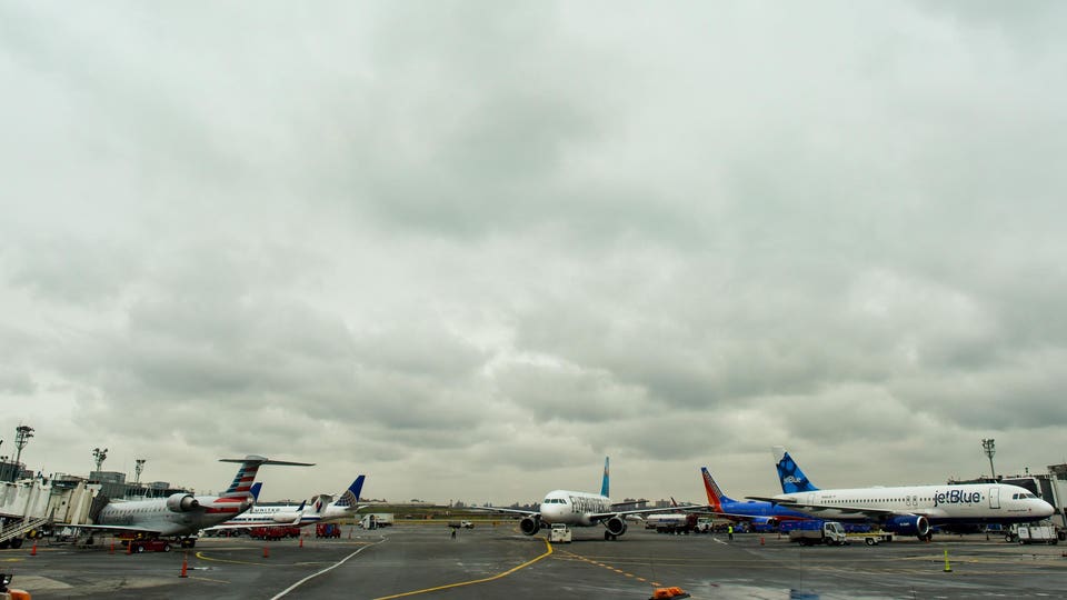 Northeast thunderstorms prompt ground delays at East Coast airports, as airlines issue waivers