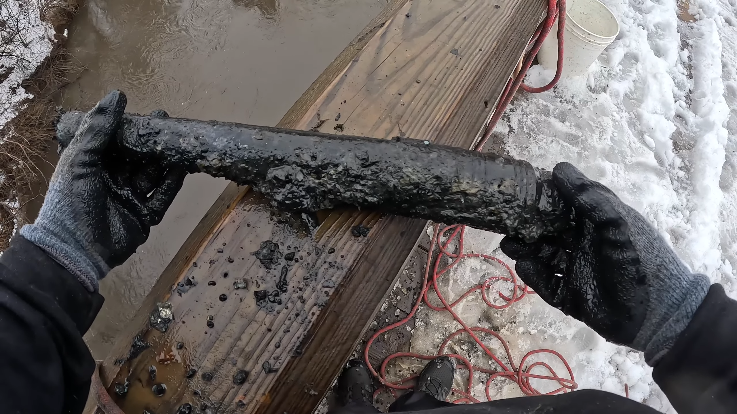 After finding 20 mm rounds, we dragged up a possible tank-gun barrel