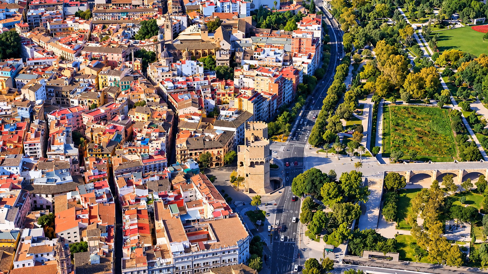 Why does this medieval gate stand so prominently in modern Valencia?