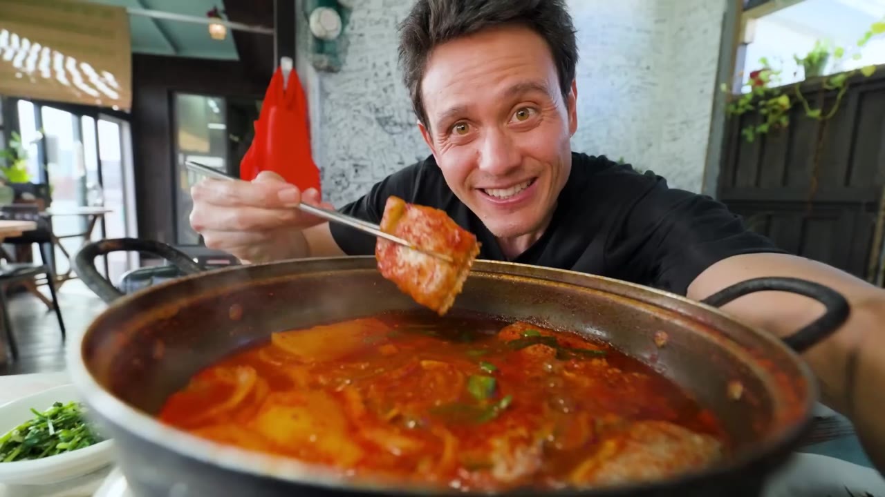 Trying fresh seafood and traditional Korean food at local restaurants