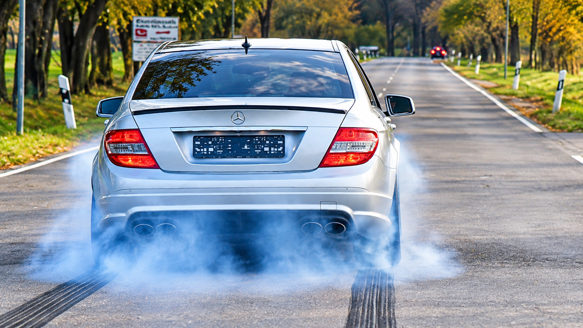 Mercedes C63 AMG burns rubber with aggressive acceleration
