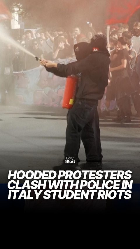 Hooded protesters clash with police in student riots in Italy