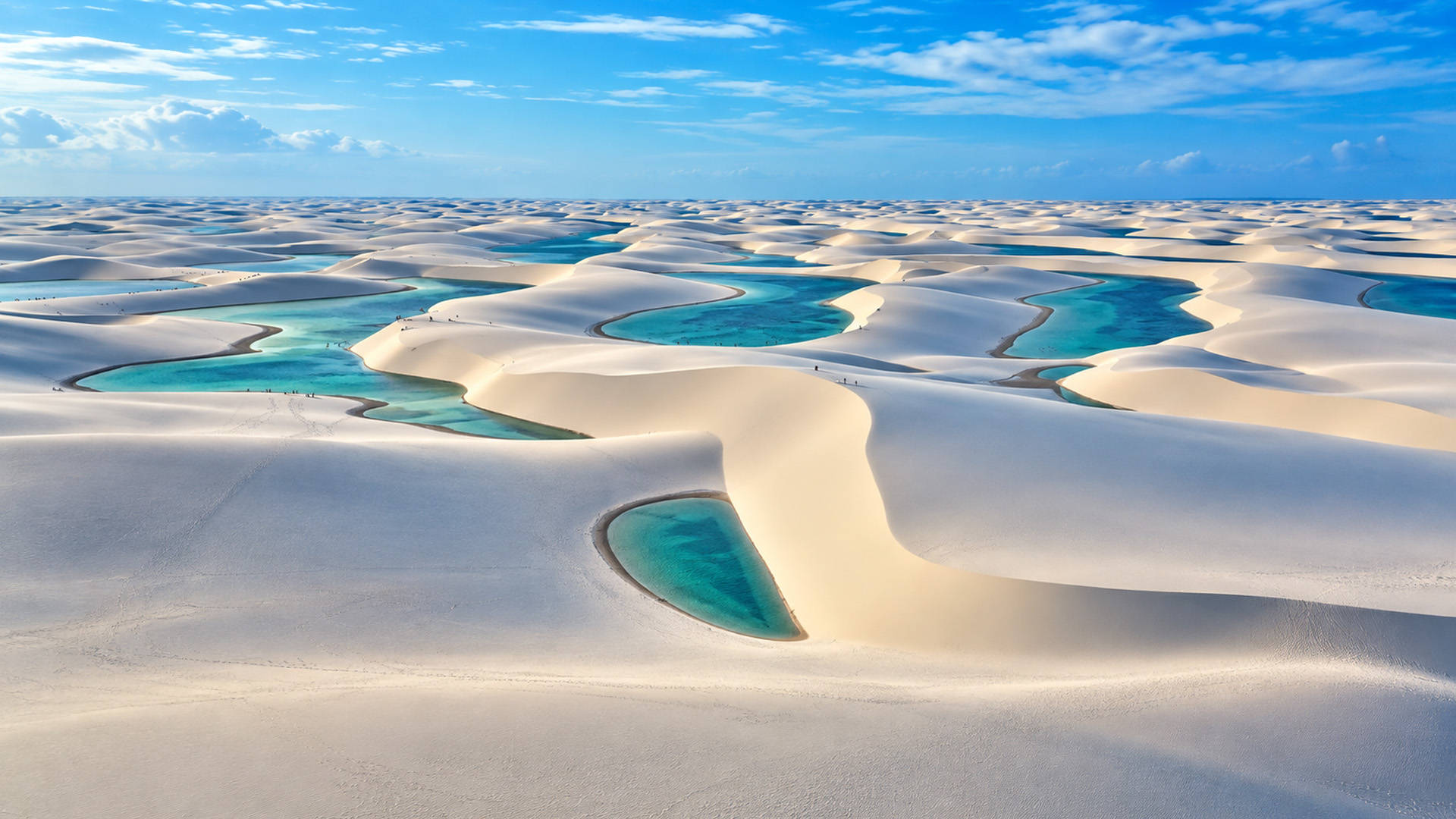 How can thousands of lagoons exist between sand dunes?
