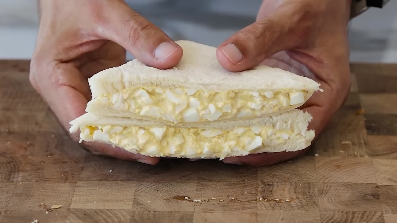 A thin butter layer helped keep his Japanese egg sandwich from turning ...