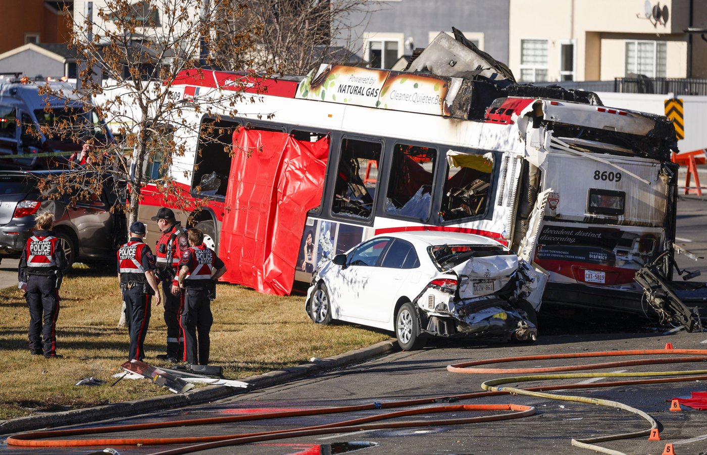 Police look to cause of fiery Calgary bus crash, try to identify third ...