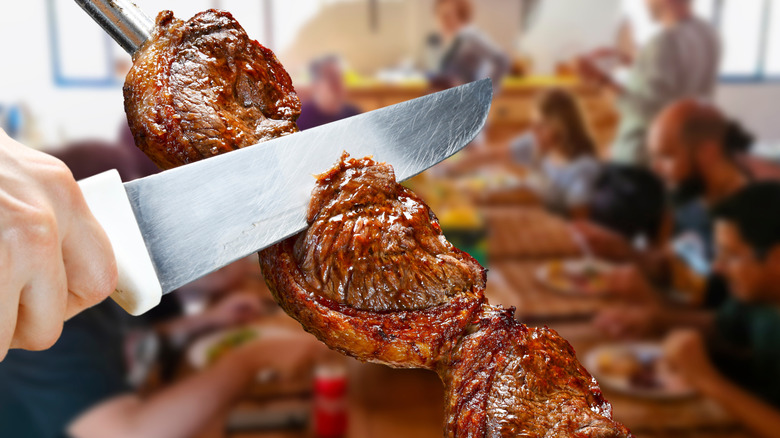 What is a Brazilian steakhouse and how does it compare to American ones?