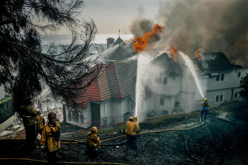 Chaotic scene as Norte fire burns homes in Orange County, fierce winds fan other blazes