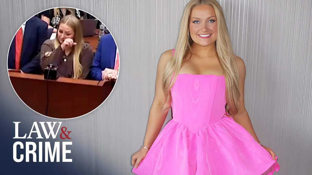 Cheerleader wipes tears as she's locked up in baby's trash death