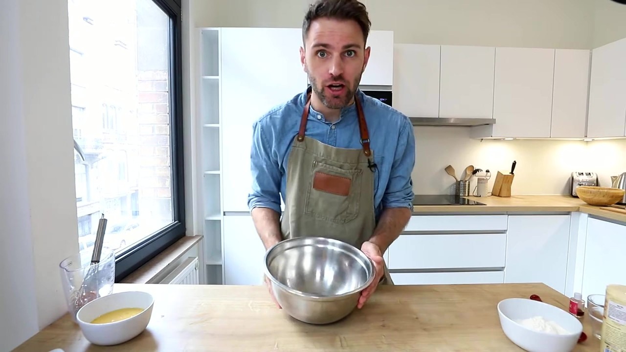 A cook makes fried chicken with Belgian Liège waffles