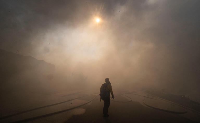 Multiple Southern California homes are ablaze in a fast-moving wildfire ...