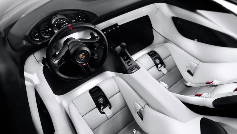 Porsche debuts Mission S supercar as profits collapse