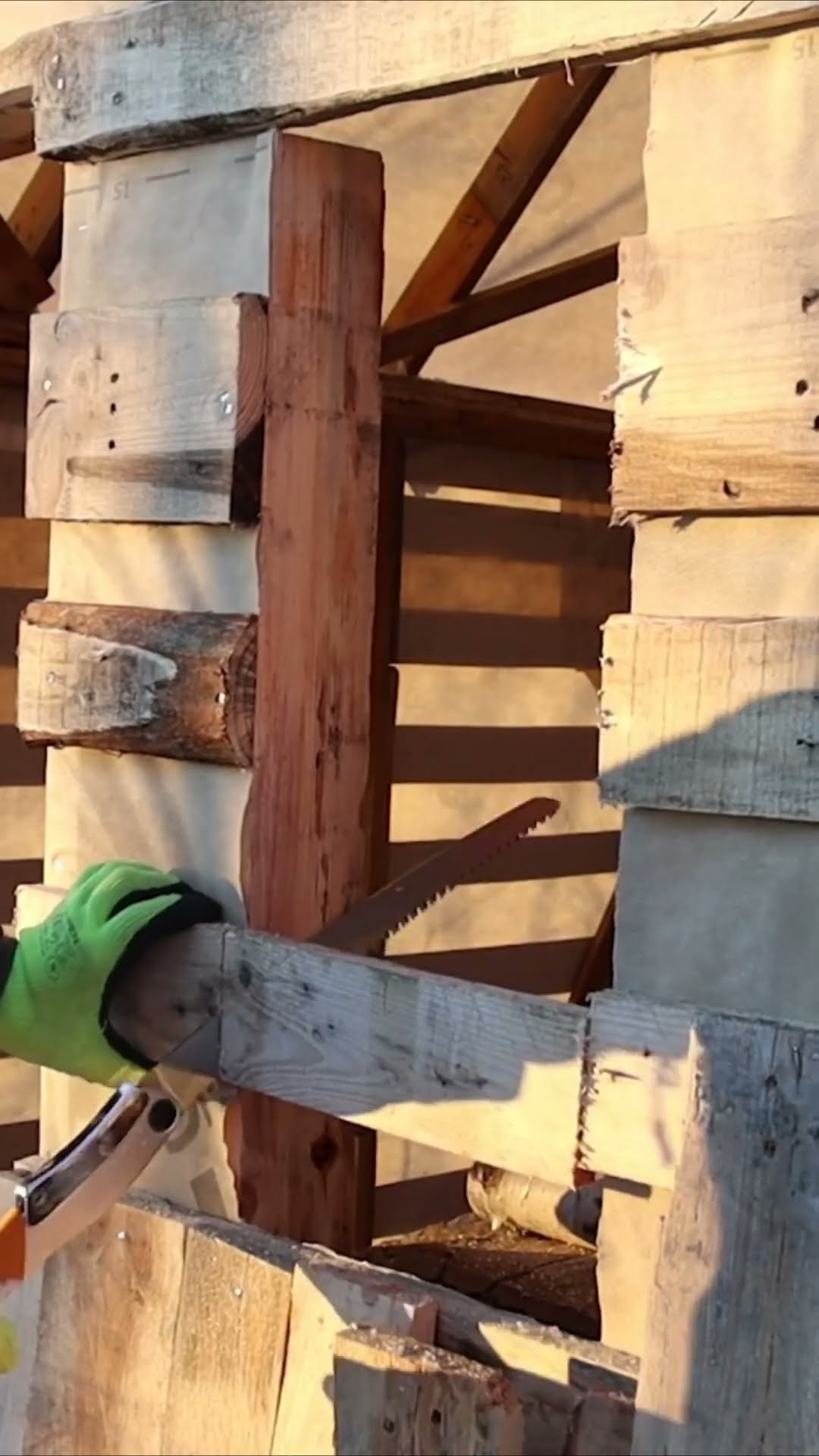 Pallet cabin build in the snowy woods | Tiny off grid home step-by-step