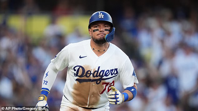Dodgers fan favorite Miguel Rojas retires from baseball moments after ...