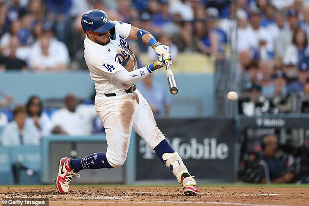 Dodgers fan favorite Miguel Rojas retires from baseball moments after ...