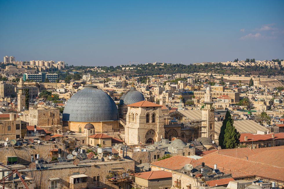 Archaeologists unearth 20ft monument beneath Jerusalem church at centre ...