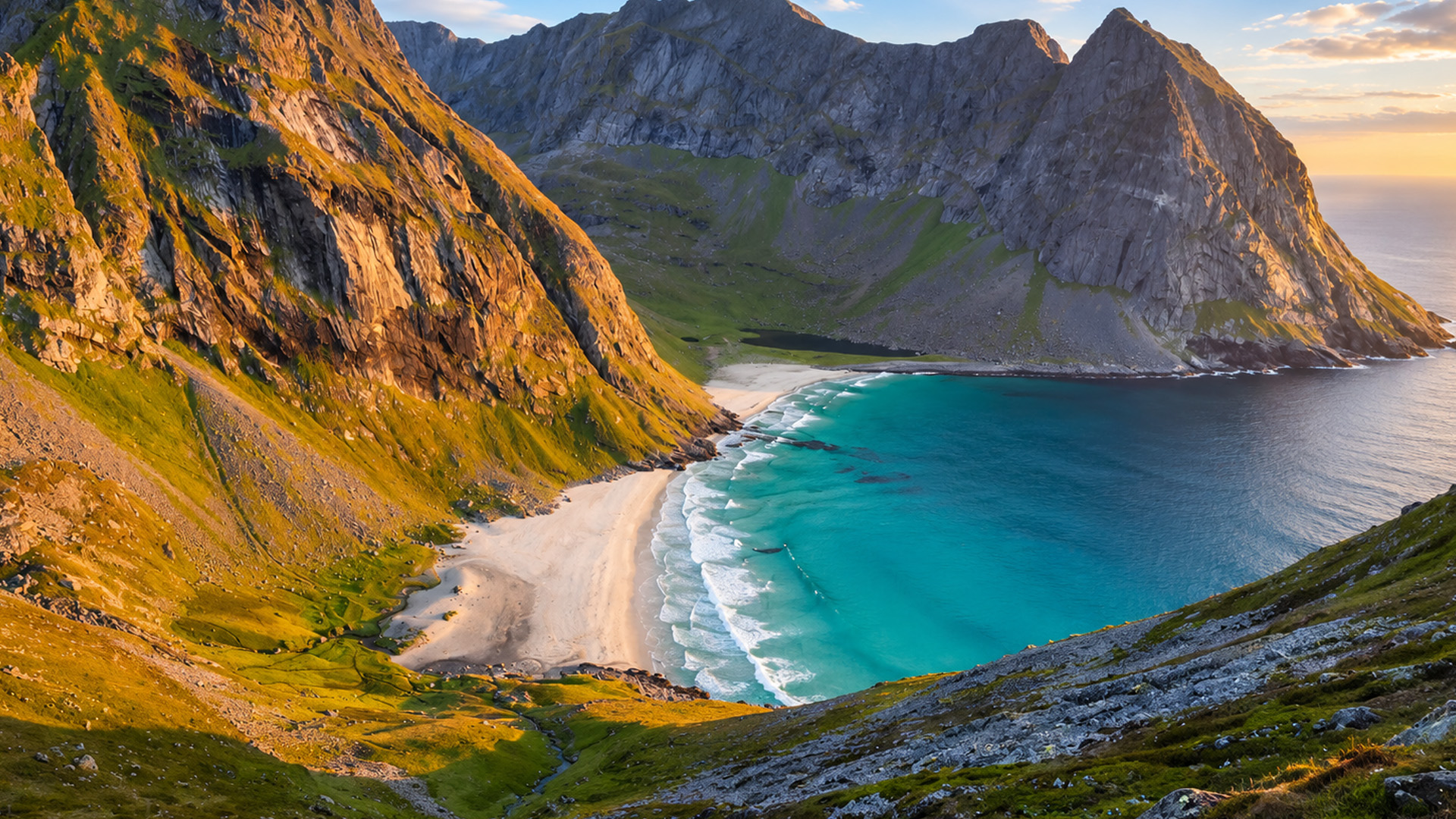Norway's remote beach between mountains and turquoise sea