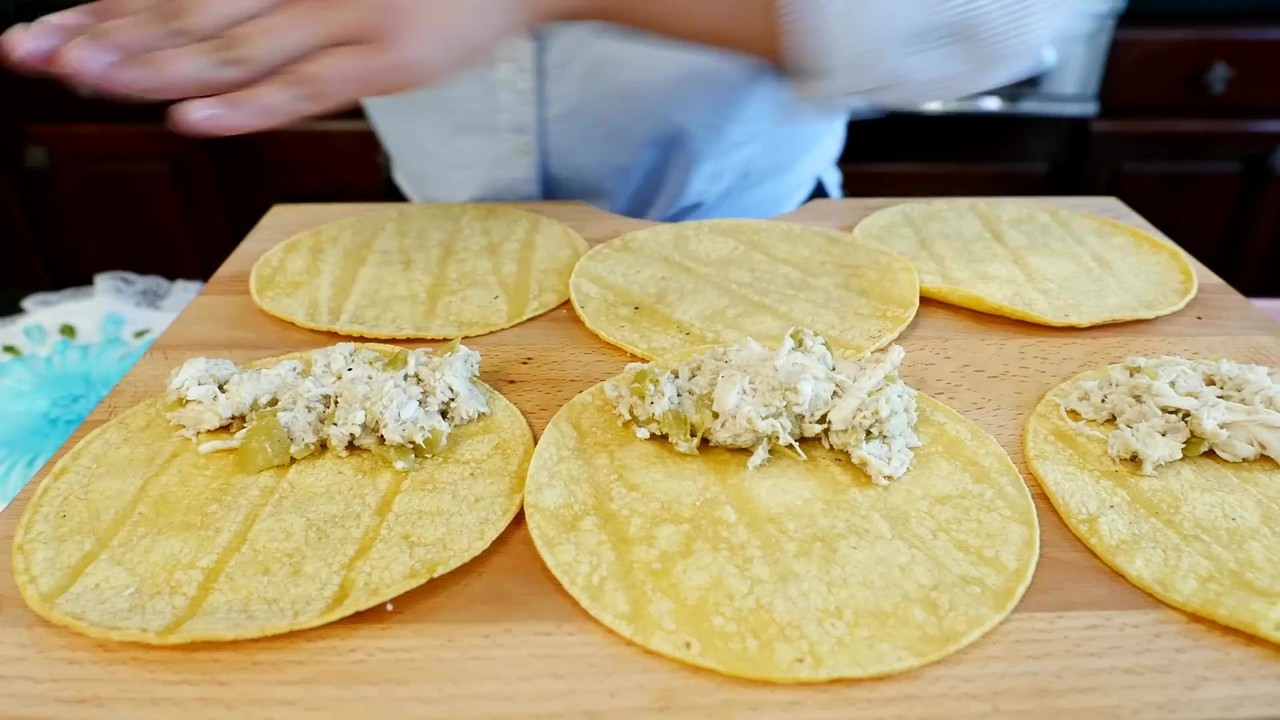 Stephanie fills and fries crispy chicken tacos dorados at home
