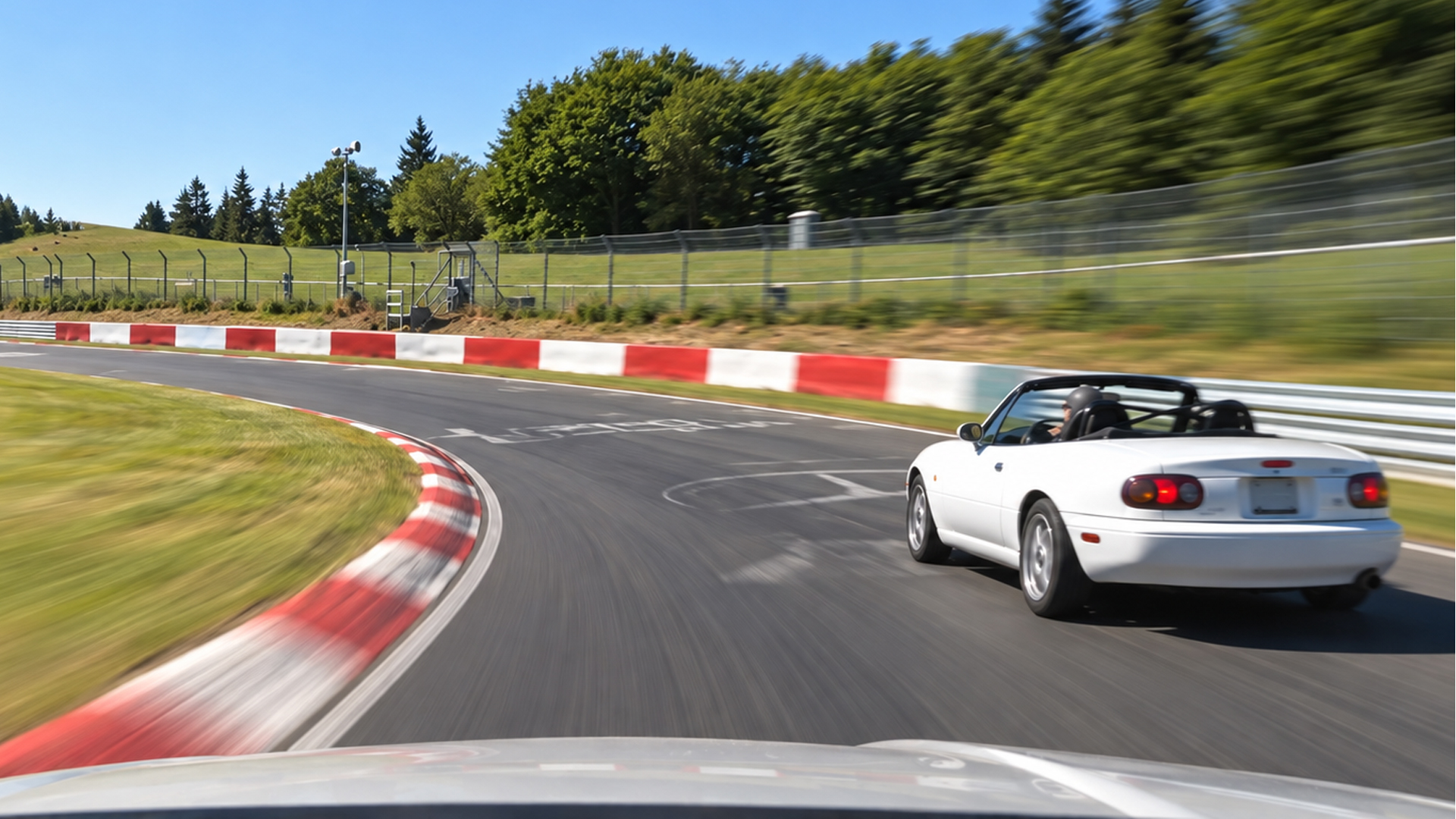 Mazda MX-5 takes a flowing Nürburgring corner
